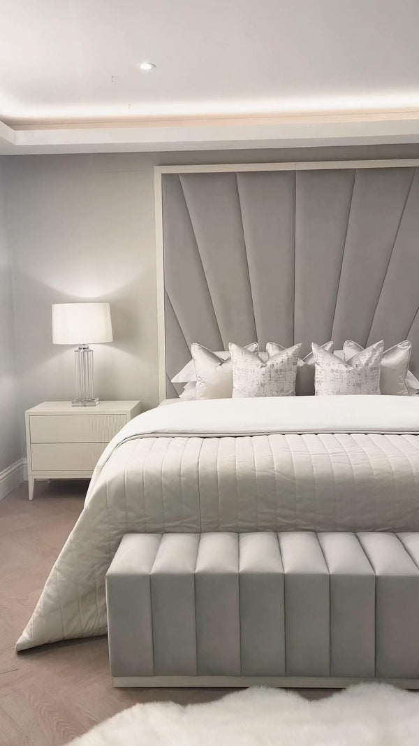 Elegant white and grey bed design for a serene bedroom decor.